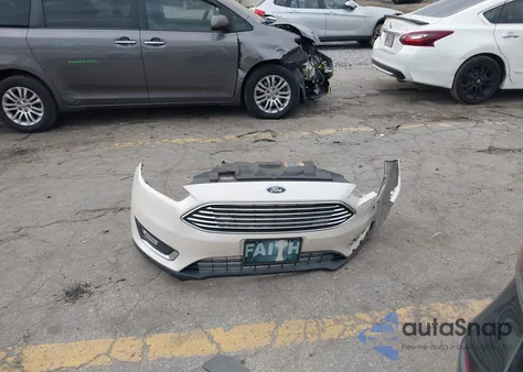 2016 Ford Focus Titanium z USA, uszkodzony, nr VIN 1FADP3N26GL222971